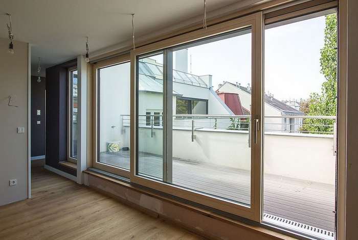 остекление балкона раздвижными алюминиевыми окнами