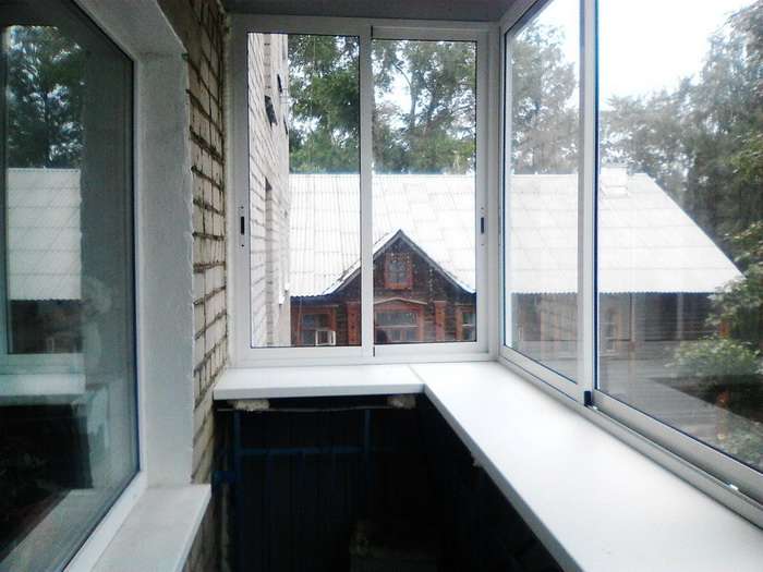 Балкон с окнами раздвижными