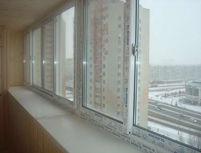 остекление балкона раздвижными окнами слайдорс